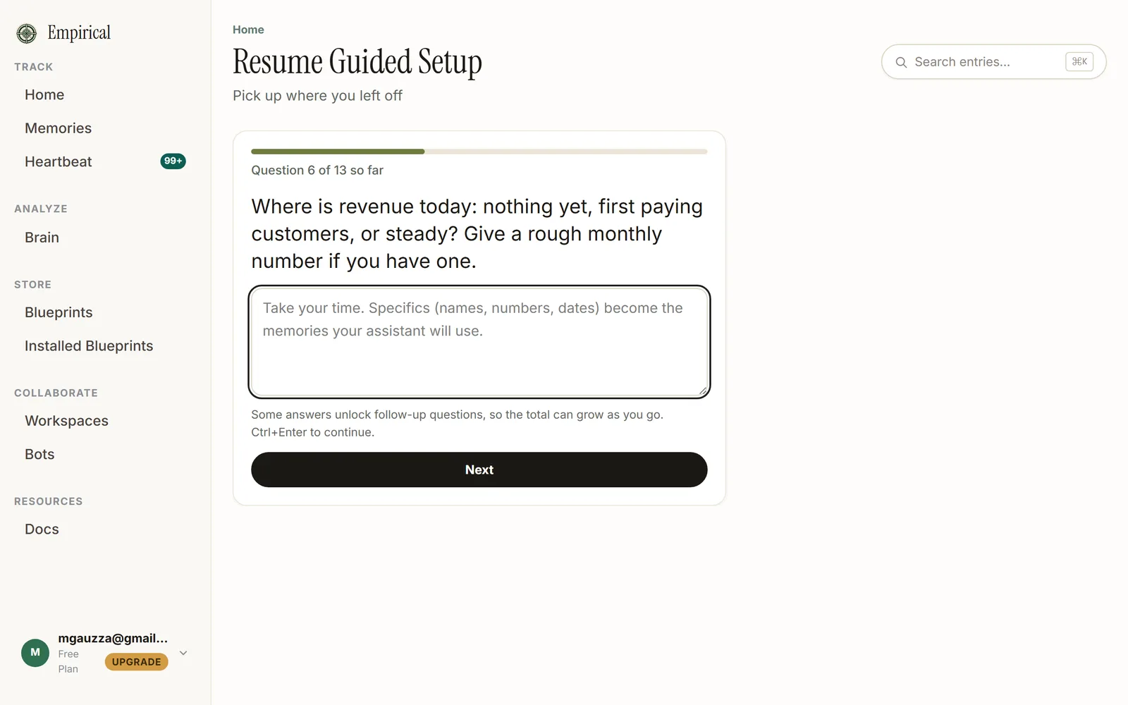 Guided setup question six of thirteen so far, asking where revenue is today, with a large answer box and a note that follow-up questions can grow the total.