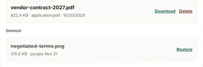 A deleted file shown struck through with its purge date, Nov 21, and a Restore link beside it